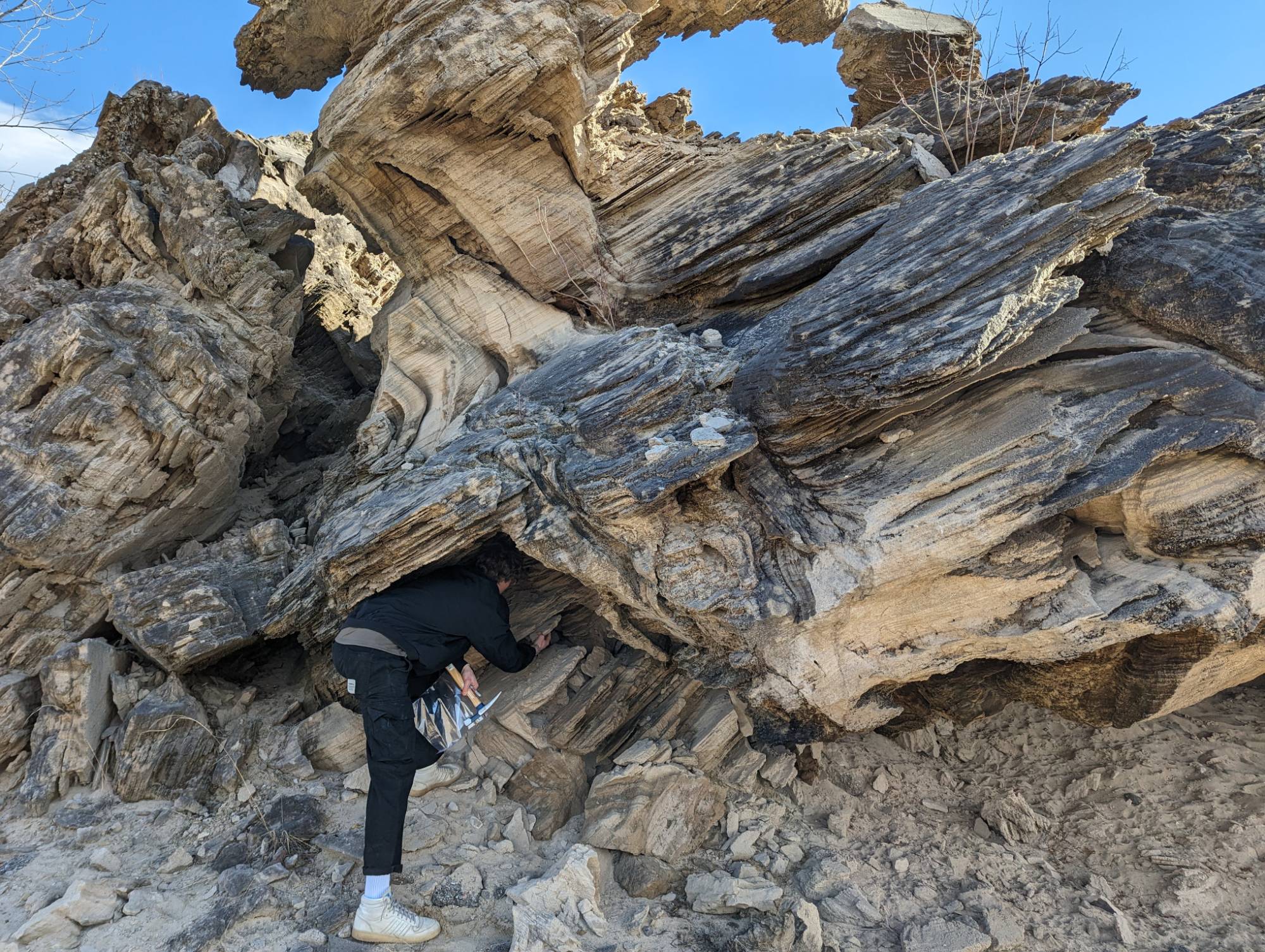 Student looking at rocks